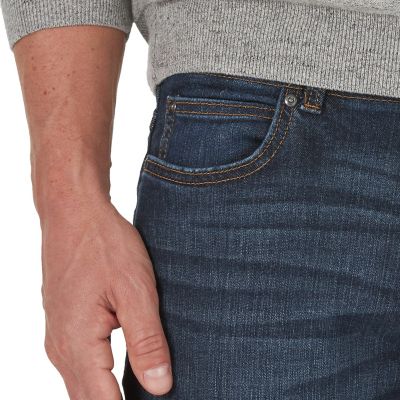 Image showing  Men's Classic Fit Mid-Rise Extreme Motion Bootcut Jeans