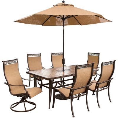 Hanover Monaco 7 Pc. Dining Set With Umbrella- Two Swivel Chairs, Four Dining Chairs, and 40 x 68 in. Table With Umbrella I ordered this set about 2 years ago