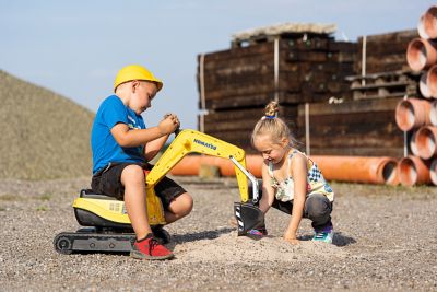 Image showing  Komatsu Crawler Excavator Ride-On with Opening Seat and Helmet, Ages 3 and Up, Yellow