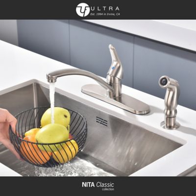 Image showing  Nita Classic Single-Handle Standard Kitchen Faucet with Side Sprayer in Rust and Spot Resist in Brushed Nickel