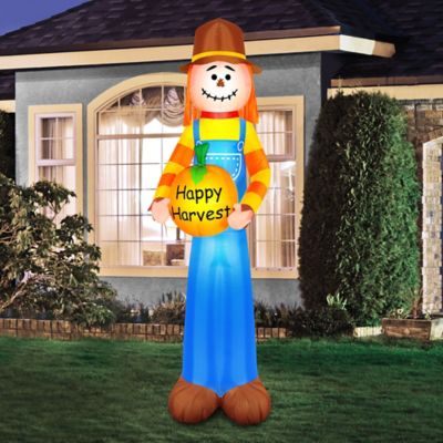 Image showing Inflatable Harvest Scarecrow Holding Pumpkin
