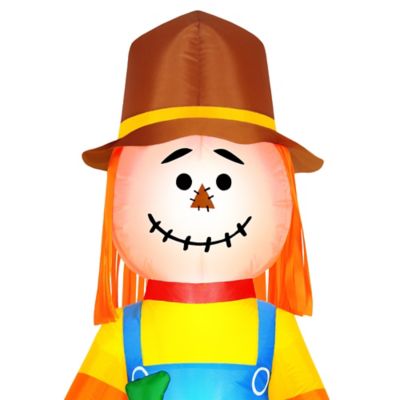 Image showing Inflatable Harvest Scarecrow Holding Pumpkin