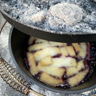 Image showing  8 qt. Cast Iron Camp Dutch Oven with Feet and Stainless Handle