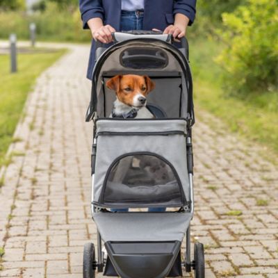 Image showing 8 th TRIXIE Foldable Pet Stroller with Weather Cover, Storage Basket and Cup Holder for Cats and Dogs