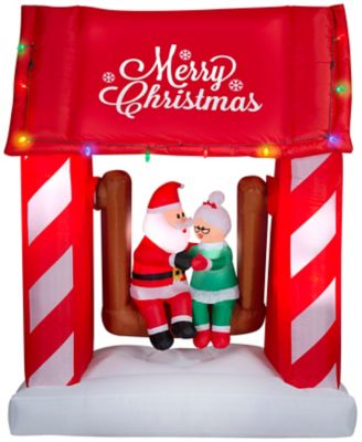 Gemmy Animated Christmas Inflatable Mr. and Mrs. Claus on Swing