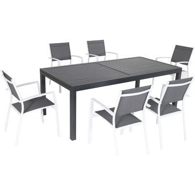 Cambridge Nova 7 pc. Outdoor Dining Set with 6 Sling Chairs and a 63 in. x 35 in. Slat top Dining Table