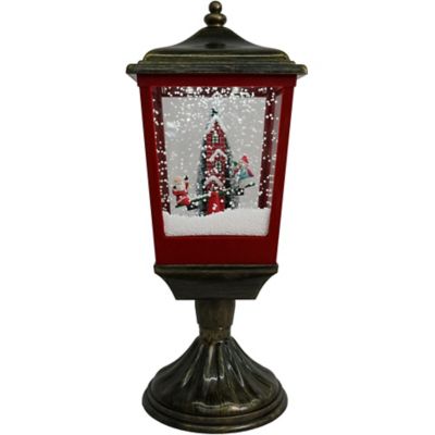 Christmas Time 20.5 in. Musical Snowy Tabletop Lamp with Seesaw Santa, Cascading Snow, and Christmas Carols