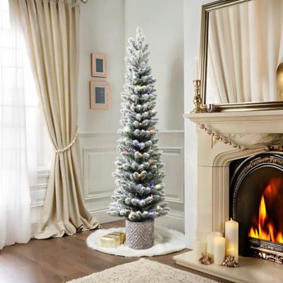 Image showing 5 ft. Flocked Artificial Tree Potted with Multi-Color Lights