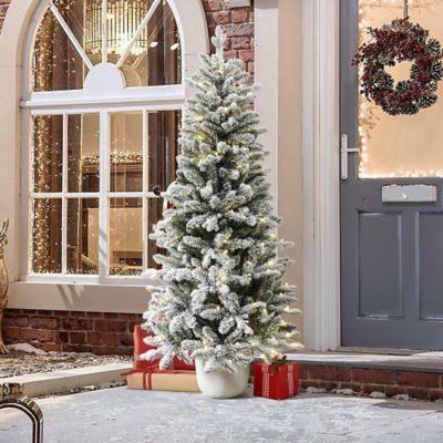 Image showing 5 ft. Multicolored Pre-Lit Flocked Artificial Tree Potted