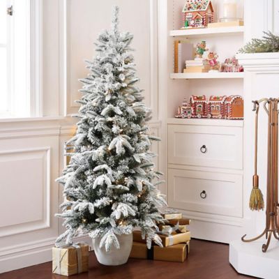 Image showing  5 ft. Pre-Lit Snow Flocked Slim Fir Potted Artificial Christmas Tree