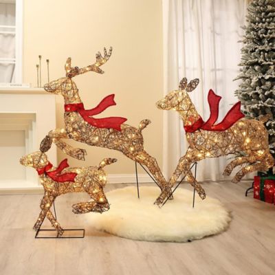 Image showing 3 pc. Natural and Plastic Rattan Running Reindeer Holiday Decoration Set with Lights