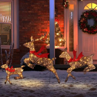 Image showing 3 pc. Natural and Plastic Rattan Running Reindeer Holiday Decoration Set with Lights