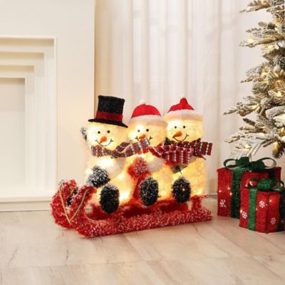 LuxenHomeSnowman Family Trio on Sled with Lights Outdoor Holiday Decoration