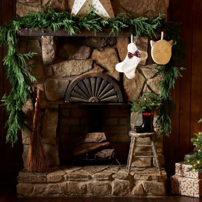 Image showing  16 in. Resin Boots with Greenery Christmas Decoration