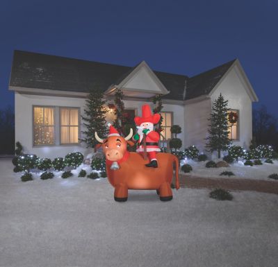 Image showing  6.5 ft. Airblown Cowboy Santa On A Bull