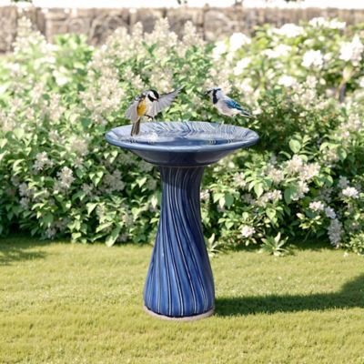 Image showing  Blue Leaves and Swirl 22-Inch Tall Ceramic Birdbath