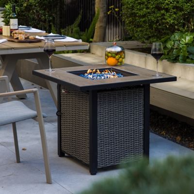 Image showing 6 th OuterMust 30 in. Propane Fire Pit Table, 50,000 BTU Hand-woven Rattan Patio Gas Fire Pit with Lid & Blue Glass Bead