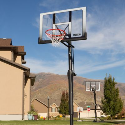 Image showing 1 th Lifetime 52 in. Adjustable In-Ground Basketball Hoop, Gray/Clear