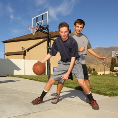Image showing 8 th Lifetime 52 in. Adjustable In-Ground Basketball Hoop, Gray/Clear