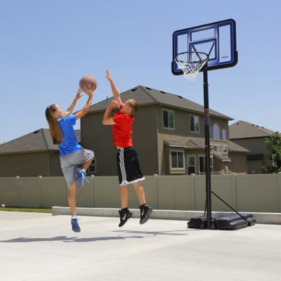 Image showing 9 th Lifetime 42 in. Adjustable Portable Basketball Hoop, Blue/Clear
