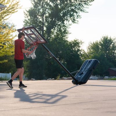 Image showing 9 th Lifetime 44 in. Adjustable Portable Basketball Hoop, Red/Clear