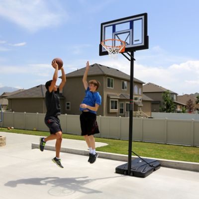 Image showing 9 th Lifetime 48 in. Adjustable Portable Basketball Hoop, Blue/Clear