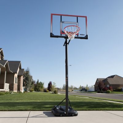 Image showing  50 in. Adjustable Portable Basketball Hoop, Red/Clear