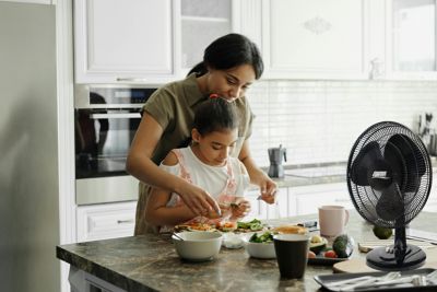 Image showing  16 in. 3-Speed Table Top Oscillating Fan, 70 deg. Oscillation, Adjustable Tilt, Metal Grill, Quiet Operation