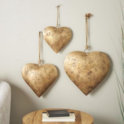 Harper & Willow Metal Tibetan Inspired Weathered Heart Indoor Outdoor Decorative Bells with Jute Hanging Rope