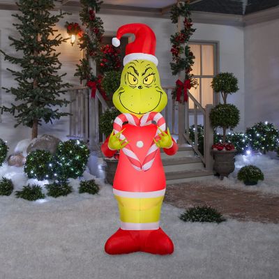 Image showing Airblown Grinch Holding Candy Cane Hearts