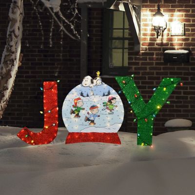 Image showing JOY Snowglobe with Skaters and Snoopy