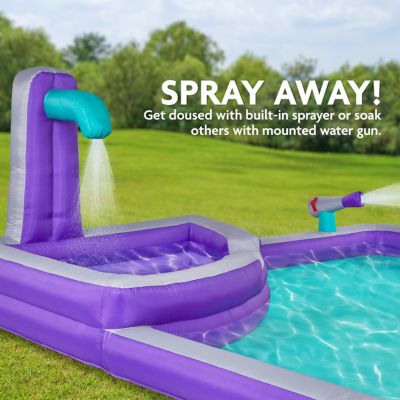 Image showing 6 th Sunny & Fun Four Corner Inflatable Water Slide Park with Climbing Wall, Slide & Deep Pool - Purple