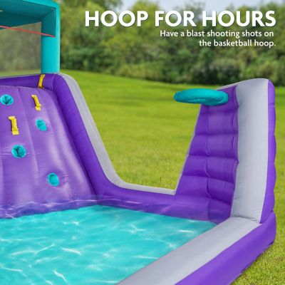 Image showing 7 th Sunny & Fun Four Corner Inflatable Water Slide Park with Climbing Wall, Slide & Deep Pool - Purple