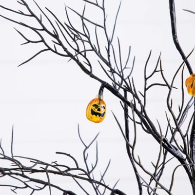 Image showing  4 ft. Pre-Lit Artificial Halloween Black Twig Tree with 24 Orange LED Pumpkin Shaped Lights