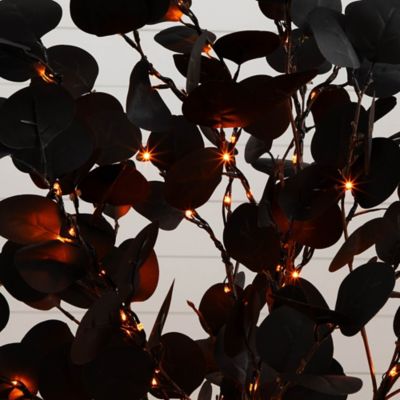 Image showing  4 ft. Pre-Lit Artificial Halloween Black Eucalyptus Tree with 160 Orange & Purple LED Lights