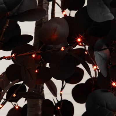 Image showing  9 ft. Pre-Lit Artificial Halloween Black Eucalyptus Tree with 700 Orange & Purple LED Lights