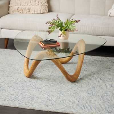 Harper & Willow Cement Stone Abstract Living Room Coffee Table with Wavy Base and Triangular Glass Top