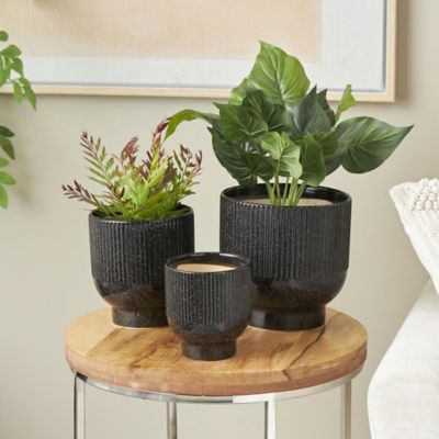 Harper & Willow Ceramic Speckled Outdoor Planter with Linear Grooves and Tapered Bases