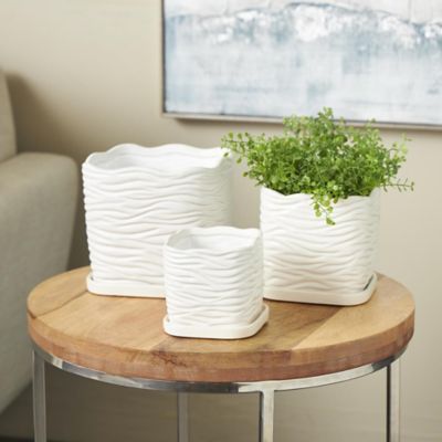 Harper & Willow Ceramic Wavy Ribbed Outdoor Planter with Attached Saucer