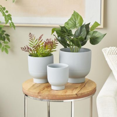 Harper & Willow Ceramic Outdoor Planter with Linear Grooves and Tapered Bases