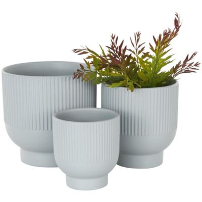 Image showing  Ceramic Outdoor Planter with Linear Grooves and Tapered Bases