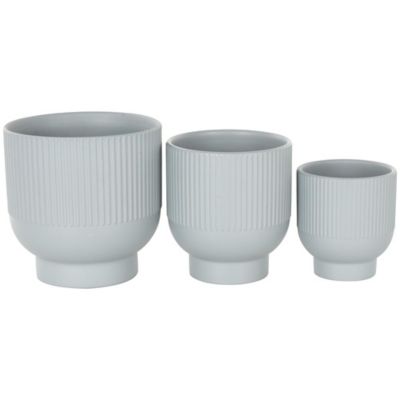 Image showing  Ceramic Outdoor Planter with Linear Grooves and Tapered Bases
