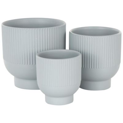 Image showing  Ceramic Outdoor Planter with Linear Grooves and Tapered Bases