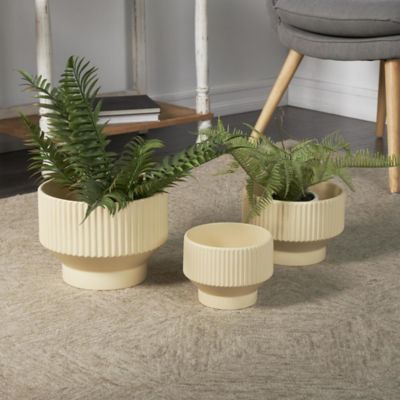 Harper & Willow Ceramic Wide Outdoor Planter with Linear Grooves and Tapered Bases