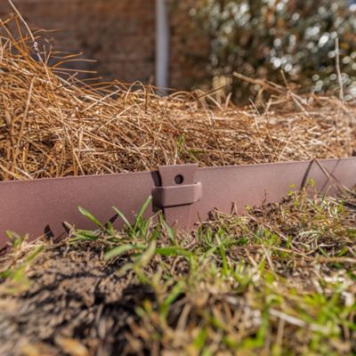 Image showing 8 th IronRidge 4 ft. x 4 in. Textured Brown Steel Landscape Edging with Stakes