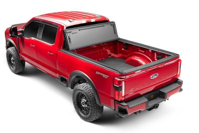 Image showing 9 th RealTruck Bak MX4 TS Hard Folding Tonneau 17-25 Ford Super Duty 6 ft. 10 ft. Bed