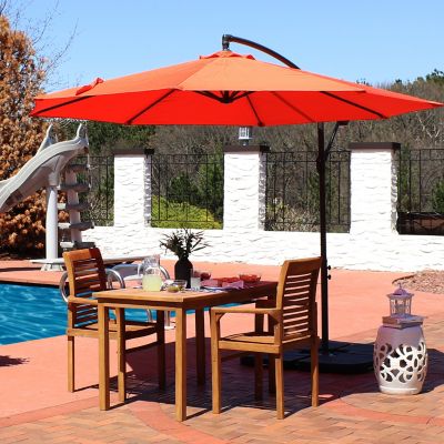 Image showing  Steel Outdoor Offset Patio Umbrella with 4-Piece Base Set - Red