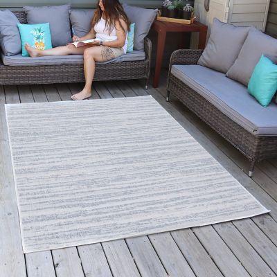 Image showing  Artistic Storms Outdoor Patio Area Rug in Iced Silver - 5 x 7 ft.
