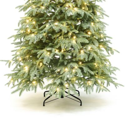 Image showing 9 th LuxenHome 6.5 ft. Pre-Lit Green PE Branches Artificial Spruce Christmas Tree with Metal Stand