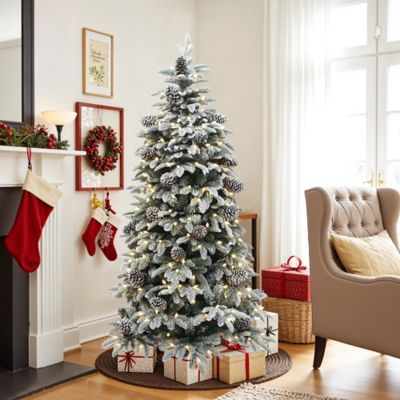 Image showing  6 ft. Pre-Lit Flocked Artificial Pine Christmas Tree with Pinecones and Metal Stand